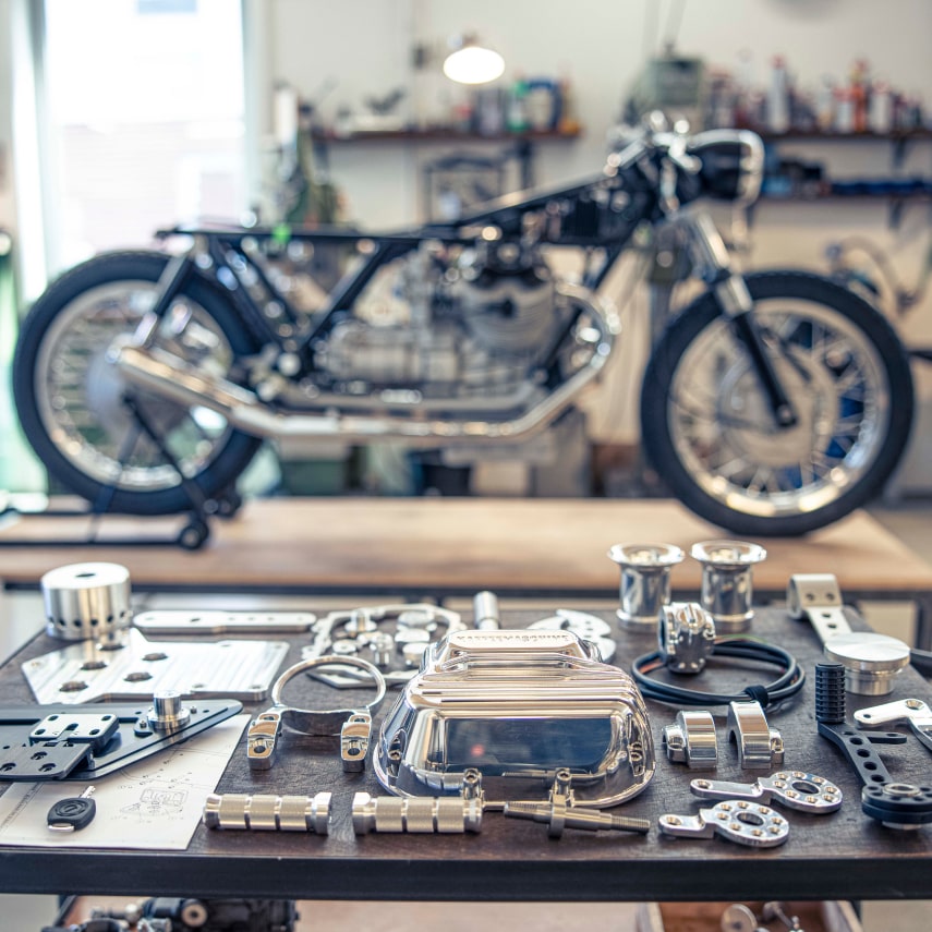 bike parts on a table in the workshop